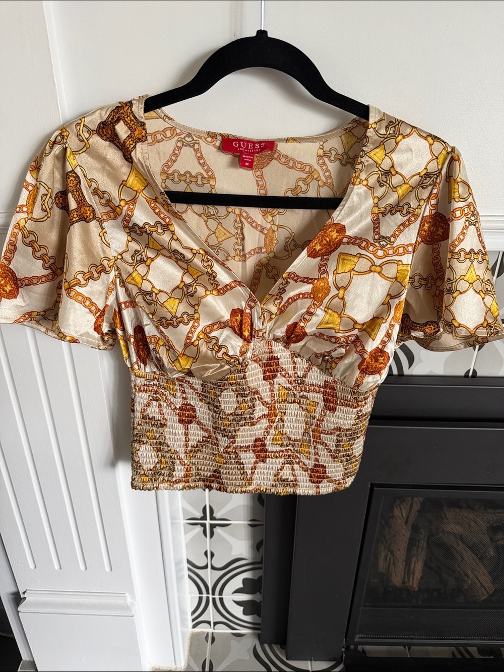 GUESS Cream Chain-Print Smocked Crop Top with Gold Accents